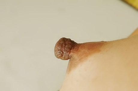 Playing with her clit is what this teenage stunner enjoys the most